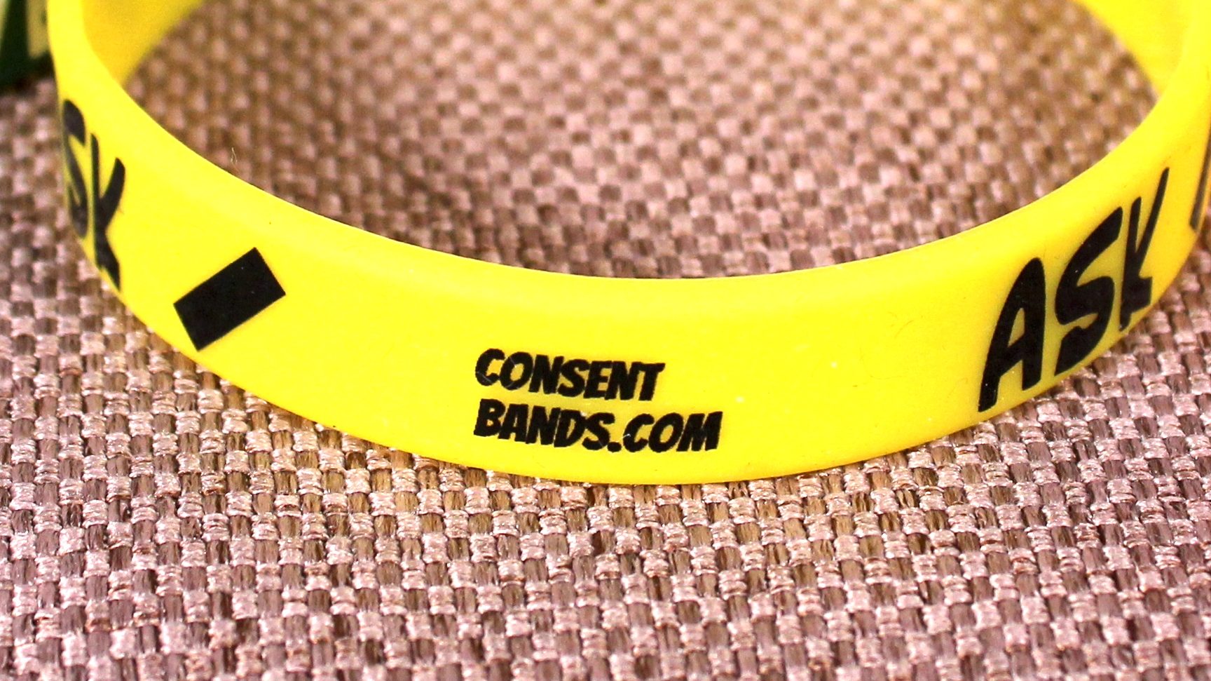 Illustration of small "consentbands.com/" branding on each band