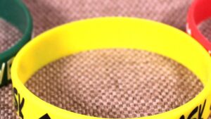 All three consent bands, showing the small branding on the back that reads "consentbands.com/".