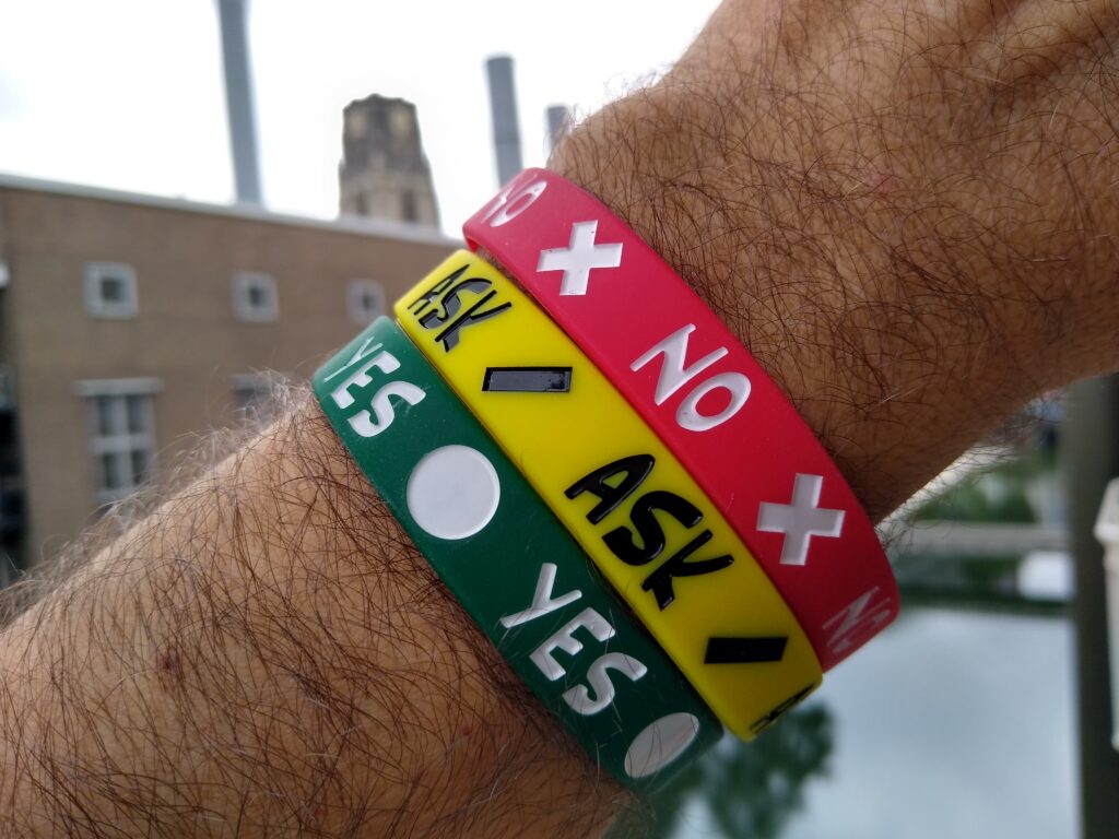 Image of three bands from run number two, worn on an arm.