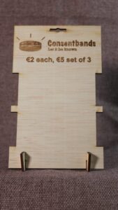 Consentband display stand with logo and suggested prices