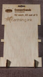 Consentband display stand with logo, suggested prices, and vendor logo